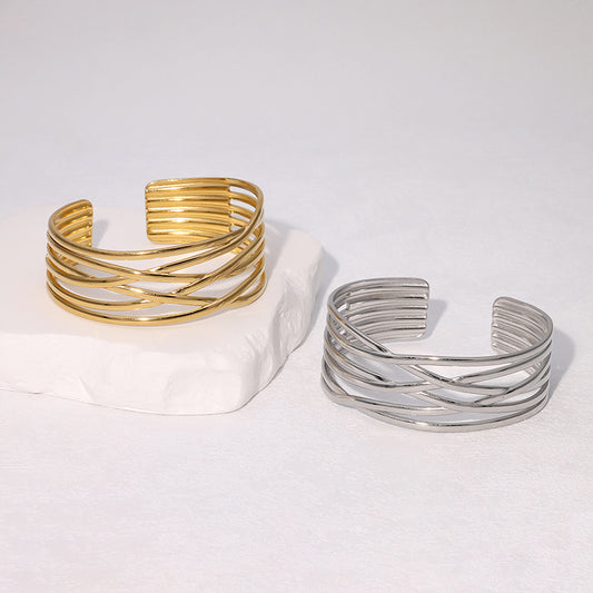 Pulsera Minimalista Geométrica Irregular Chapada en Oro de Acero Inoxidable con Líneas Limpias
