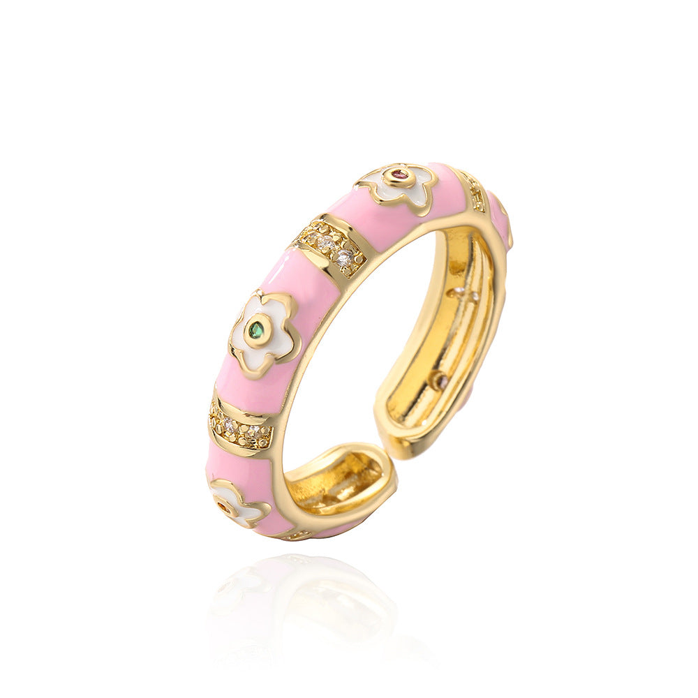 Anillo de flores geométricas irregulares estilo bohemio para mujer, hecho de cobre con chapado en oro de 18 quilates y acabado esmaltado