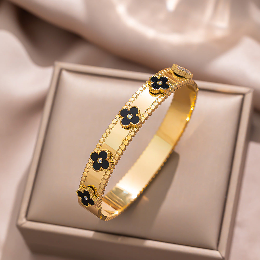Bracciale a quadrifoglio minimalista da donna in acciaio al titanio con intarsio di strass e placcatura anti-ossidazione