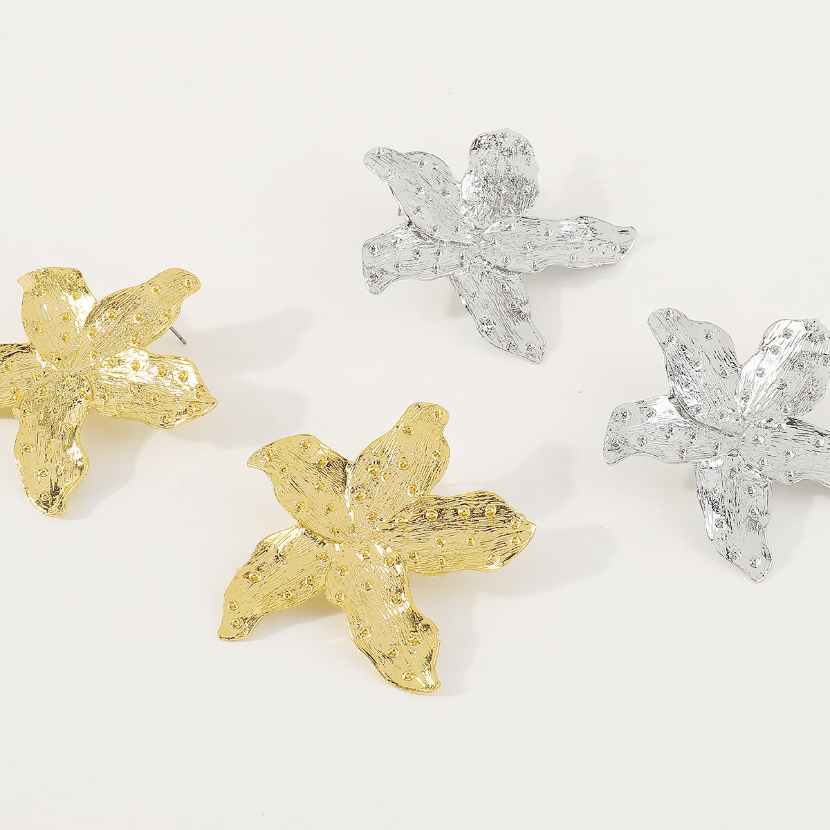 Pendientes de aleación con diseño de estrella geométrica, estilo dulce y atrevido, con acabado chapado para mujer