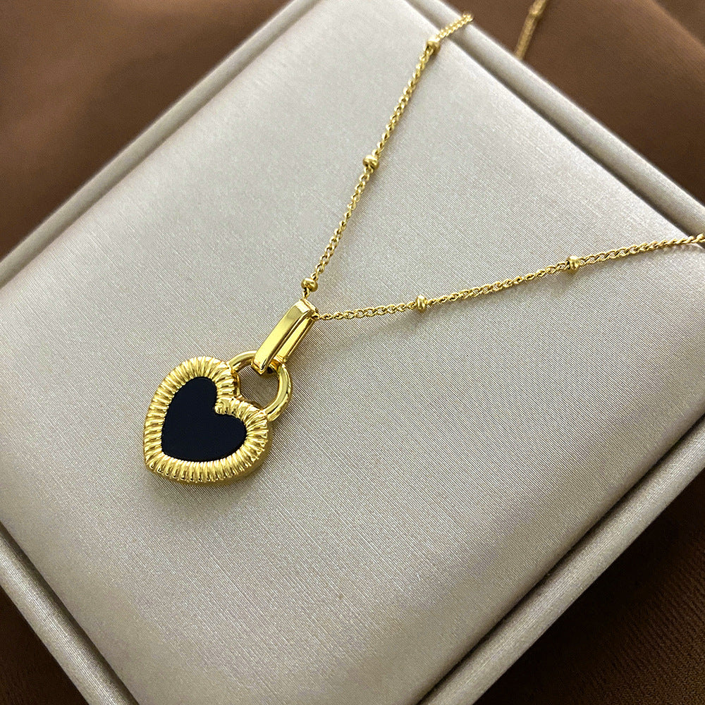 Collana da donna minimalista con pendente a forma di animale in acciaio al titanio, finitura placcata e delicata catena clavicolare
