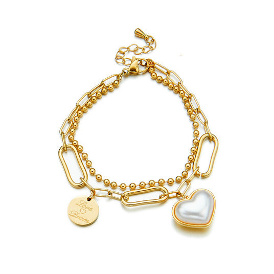 Pulsera con colgante redondo grabado, con incrustaciones de perlas, con forma de corazón doble irregular, estilo minimalista vintage, de acero de titanio con acabado chapado