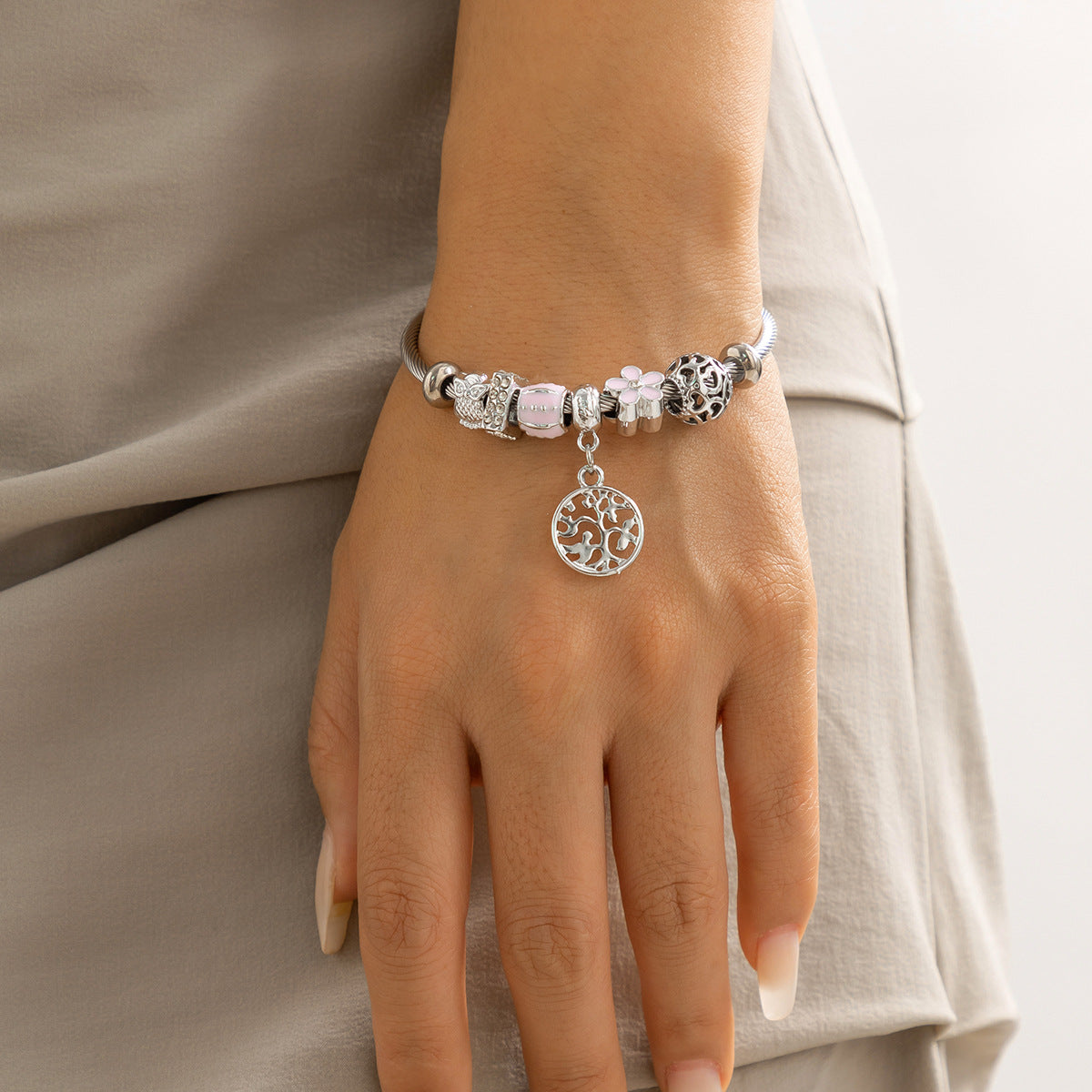 Pulsera geométrica de aleación con diseño floral rústico, dijes de ojos que brillan en la oscuridad y acabado antiguo