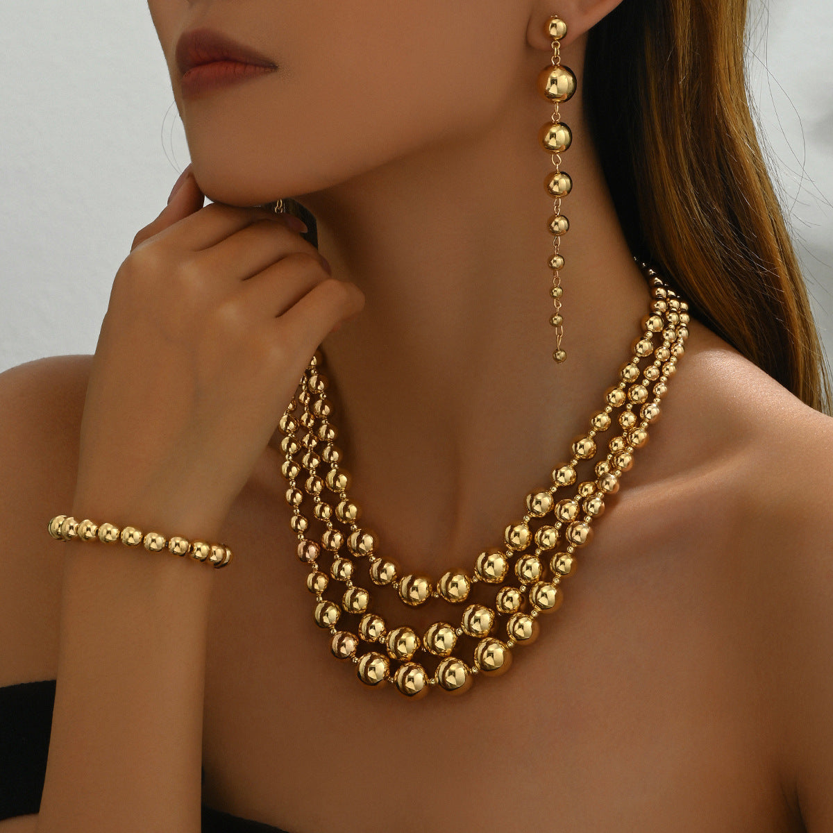 Set di collana con pendente in lega da donna in stile geometrico con orecchini e bracciale placcati, con anelli rotondi e ovali e catena a clavicola con perline