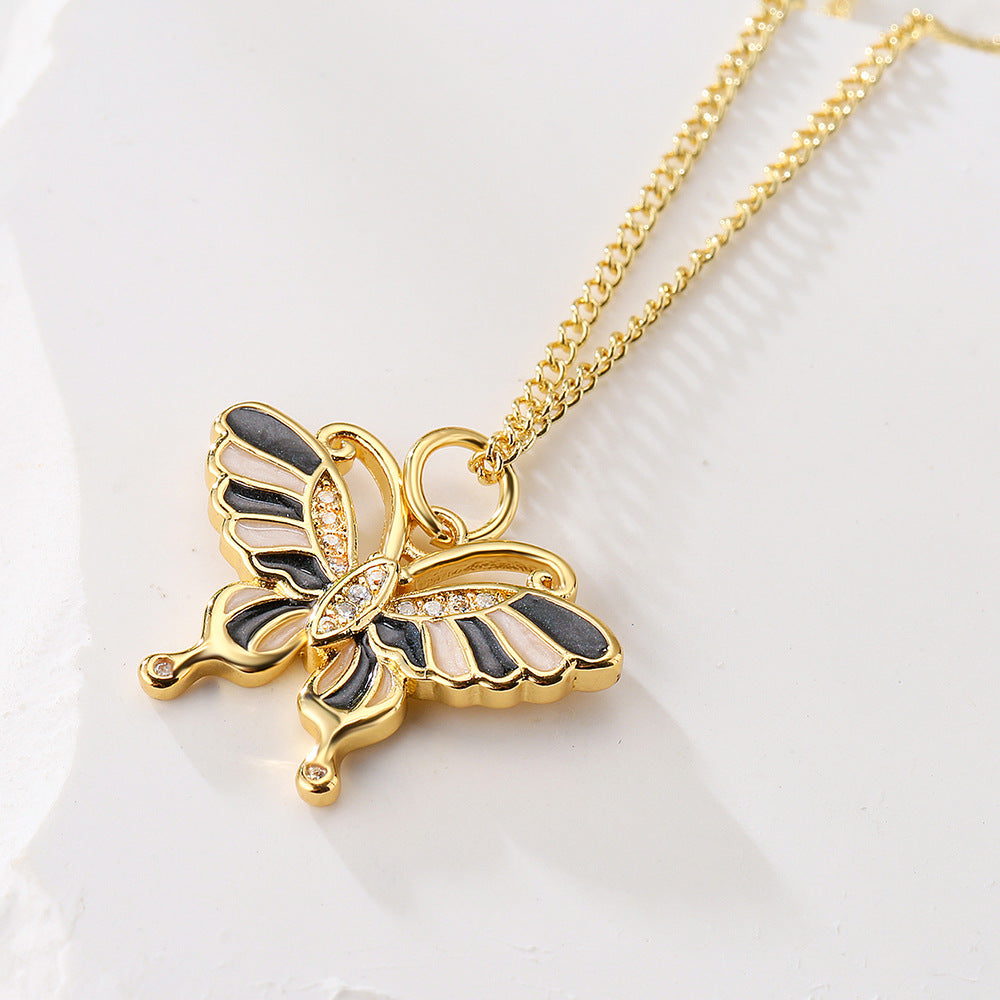 Minimalist Butterfly Pendant Necklace for Women with Copper Base Plated in 18K Gold and Enamel Finish Featuring Cubic Zirconia Accents