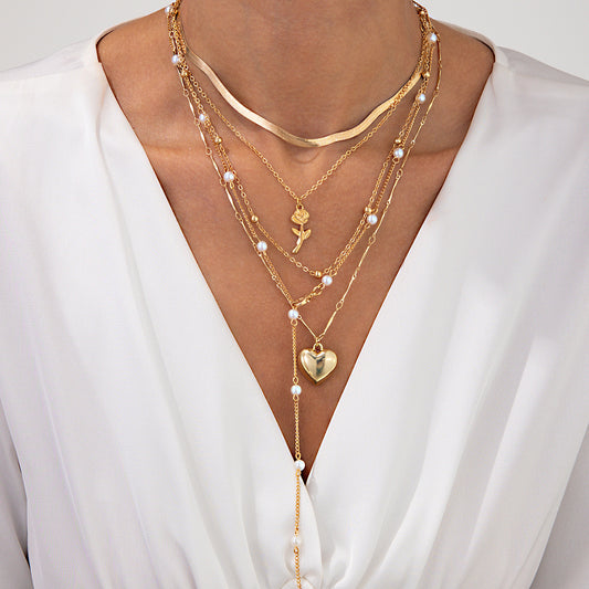Collar minimalista de capas en forma de corazón con colgante de perlas en cadena de serpiente para mujer