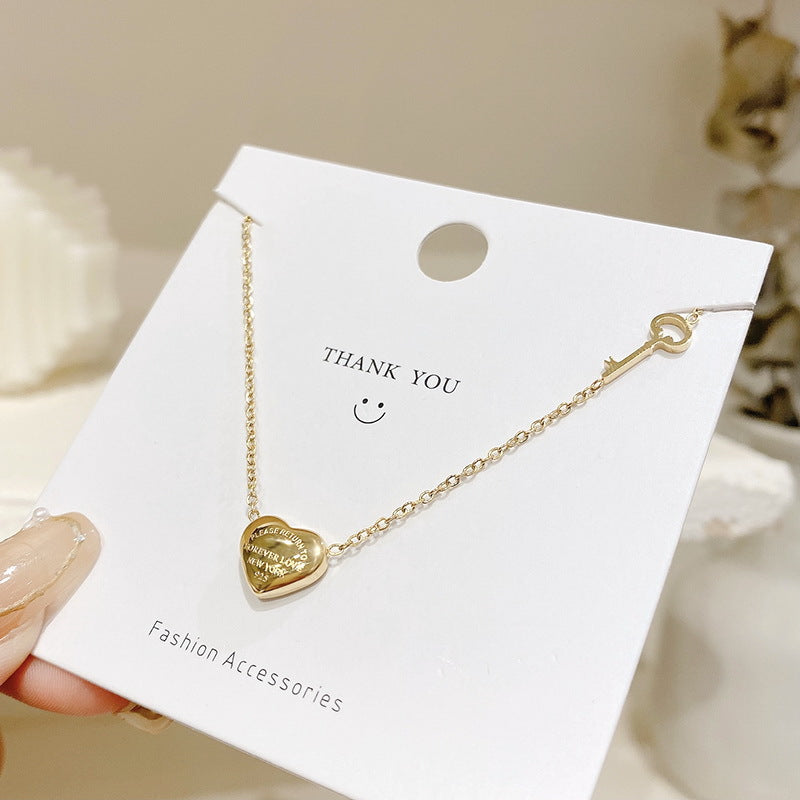 Collana con ciondolo a cuore in titanio minimalista e carino con finitura placcata da donna, design a catena ondulata