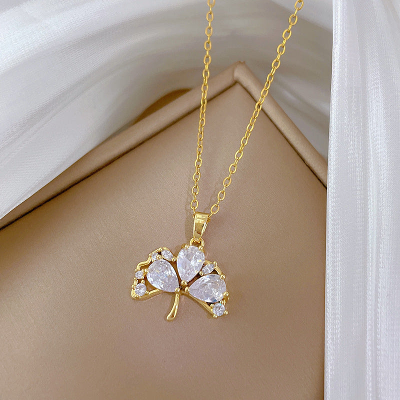 Elegant Ginkgo Leaf Pendant Necklace in Titanium Steel with Full Rhinestone Inlay for Women, Delicate Clavicle Chain with Geometric and Natural Design