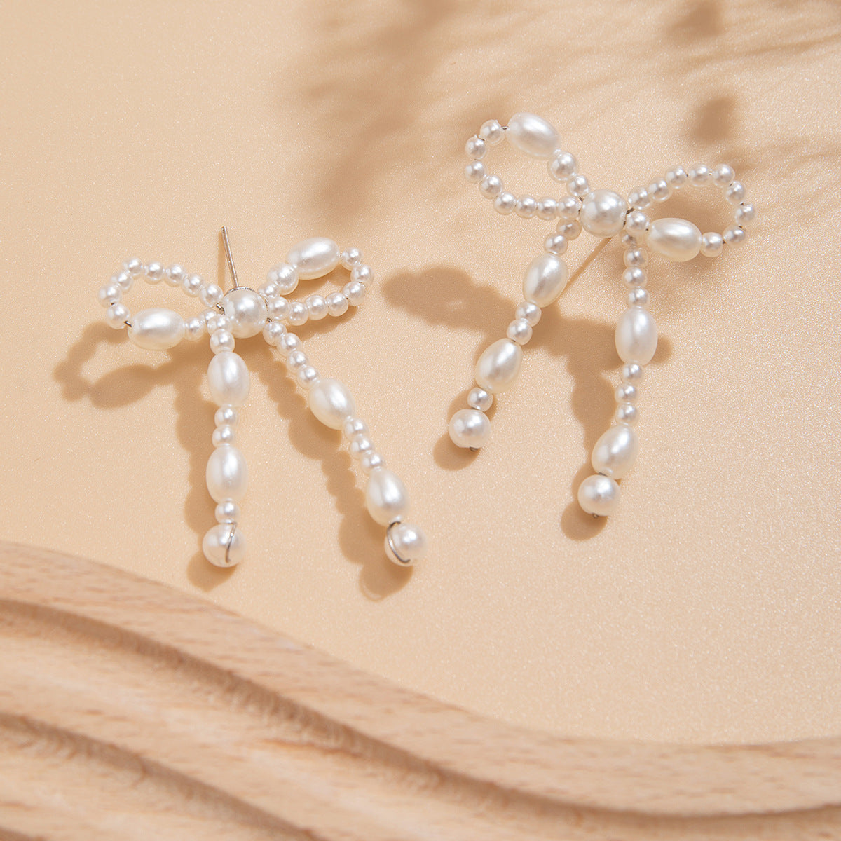 Minimalist Elegant Imitation Pearl Bow Stud Earrings Plated Steel Post for Women
