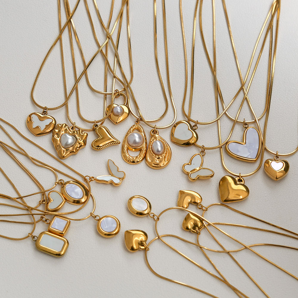 Collar minimalista de acero de titanio con forma de corazón, chapado en oro, perla y cadena ajustable para mujer