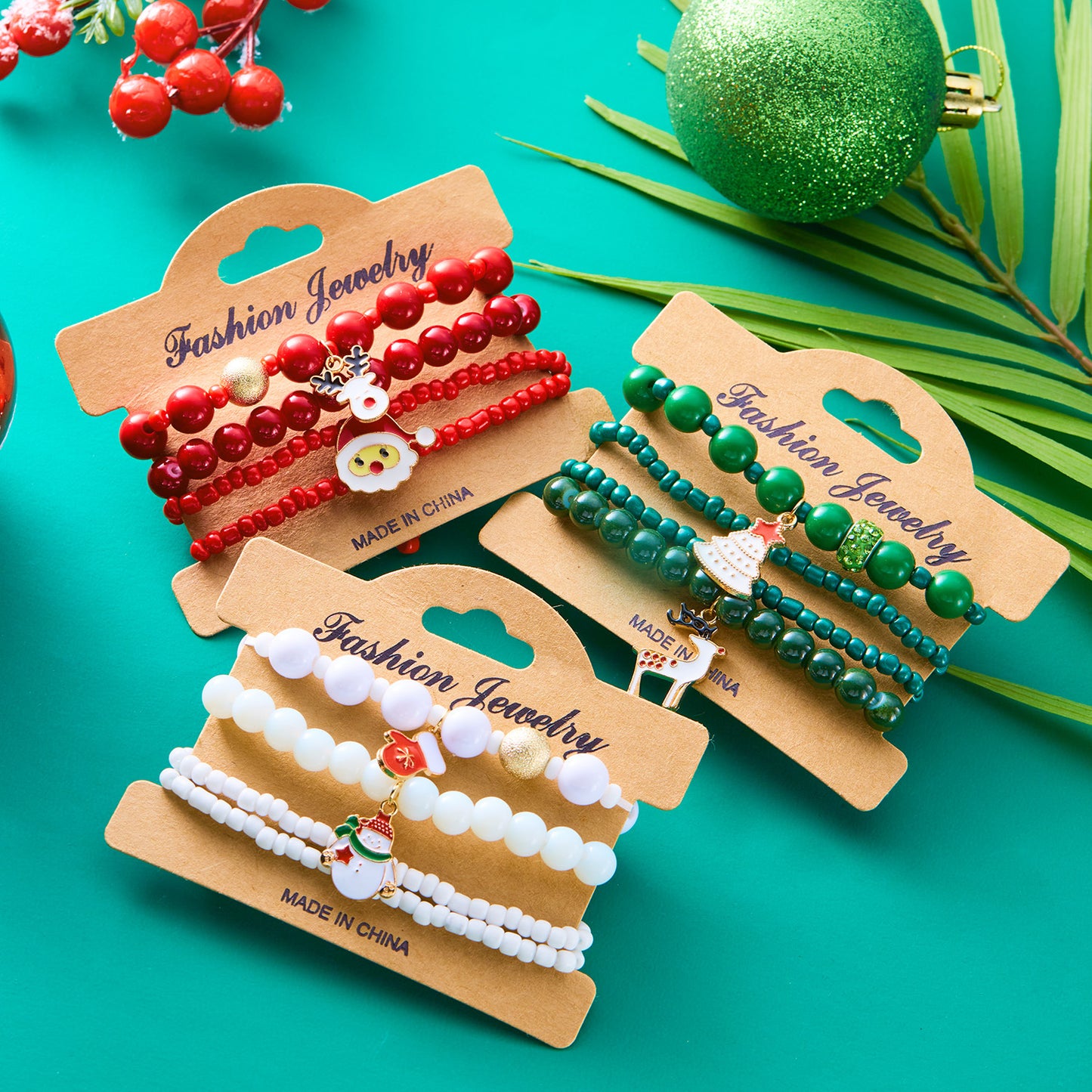 Bracciale da donna natalizio con pupazzo di neve e Babbo Natale in stile cartone animato, in lega di zinco con lavorazione artigianale