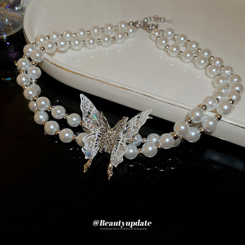 Elegante collar de mariposa de doble capa estilo francés con imitación de perla y colgante de cristal para mujer, cadena de clavícula