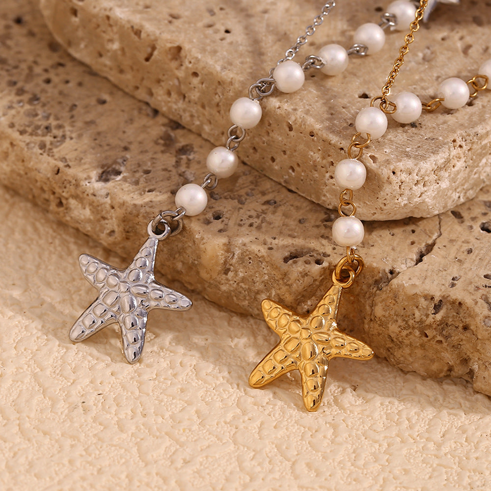 Collana con ciondolo a stella marina asimmetrica vintage da donna in acciaio inossidabile con placcatura in oro 18 carati e inserti in perle