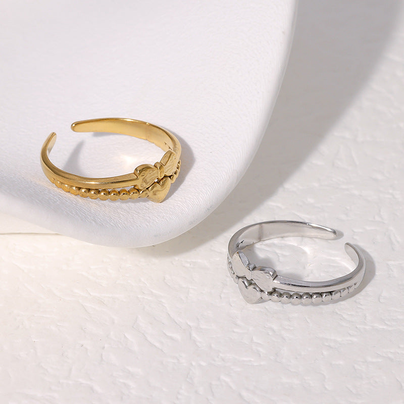 Anello regolabile da donna in acciaio inossidabile con fiocco a forma di cuore minimalista e finitura placcata