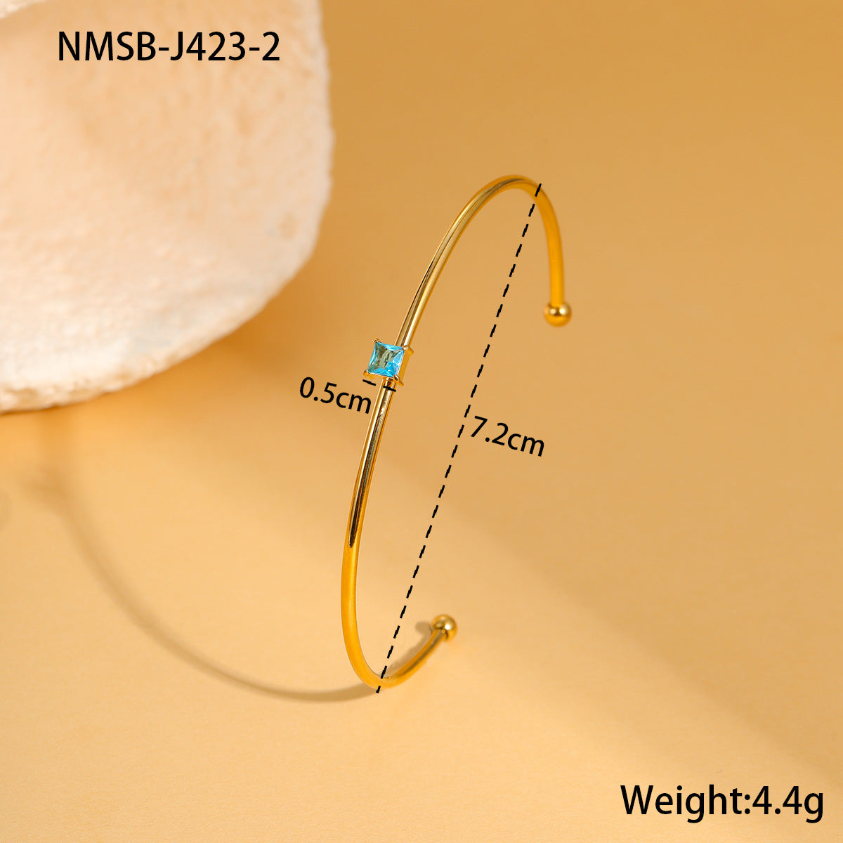 Bracciale minimalista geometrico in acciaio inossidabile con placcatura in oro e intarsio di zirconi colorati come pietra portafortuna