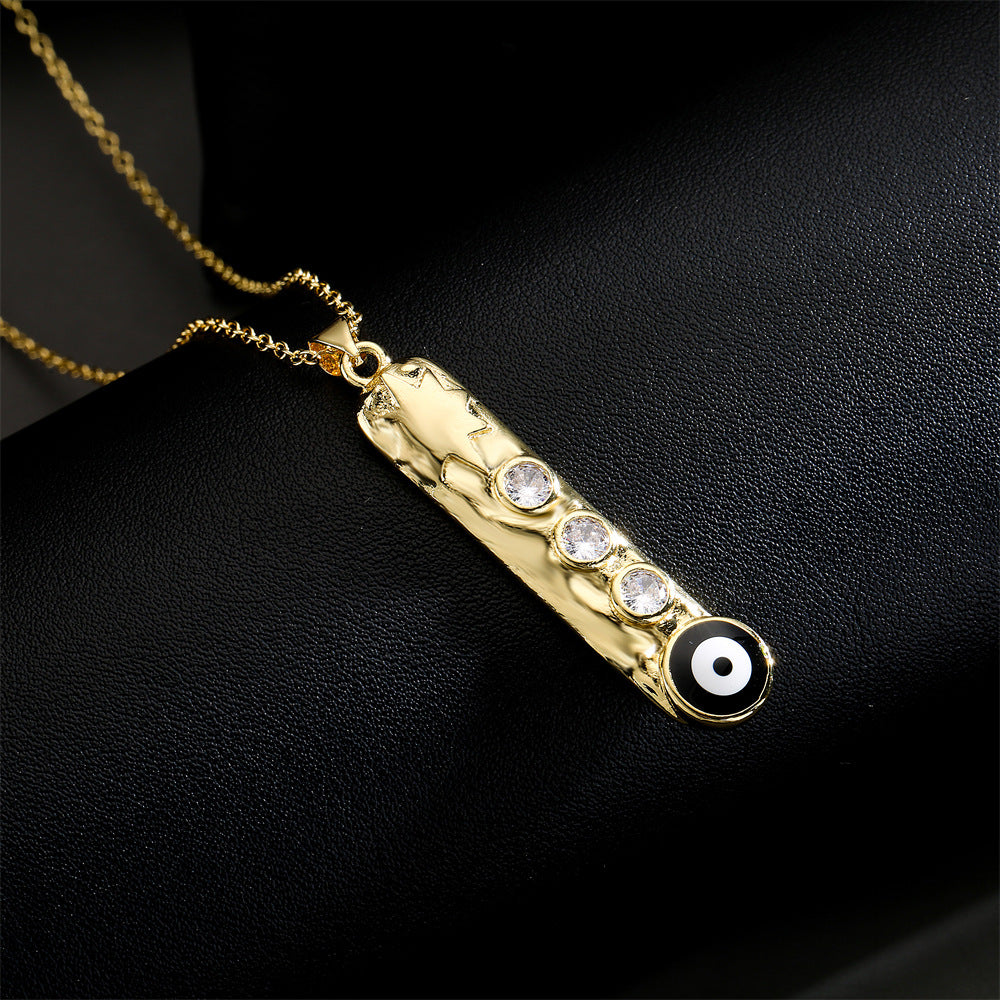 Collana con ciondolo a barra verticale geometrica con base in rame e placcatura in vero oro, design smaltato a occhio turco