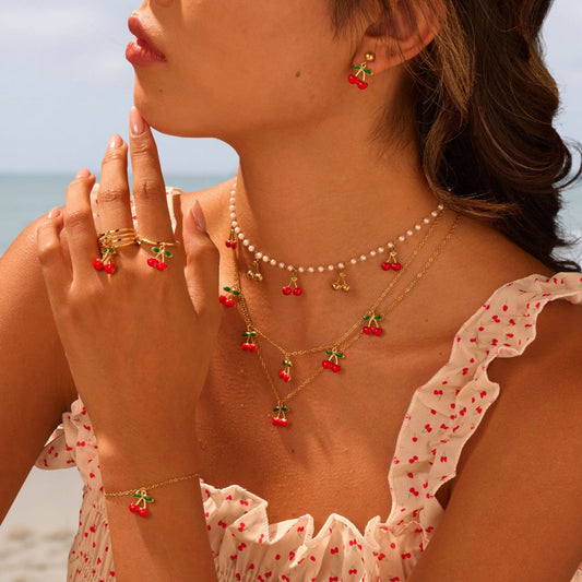 Juego de collar y aretes de acero inoxidable con colgante de fruta en forma de cereza y acabado chapado para mujer