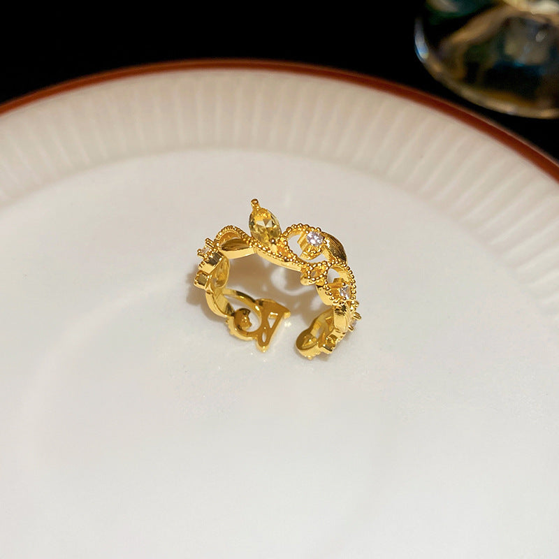 Anello da donna aperto a rombo a forma di fiore di iris in rame con intarsio di zirconi, ispirato al vintage