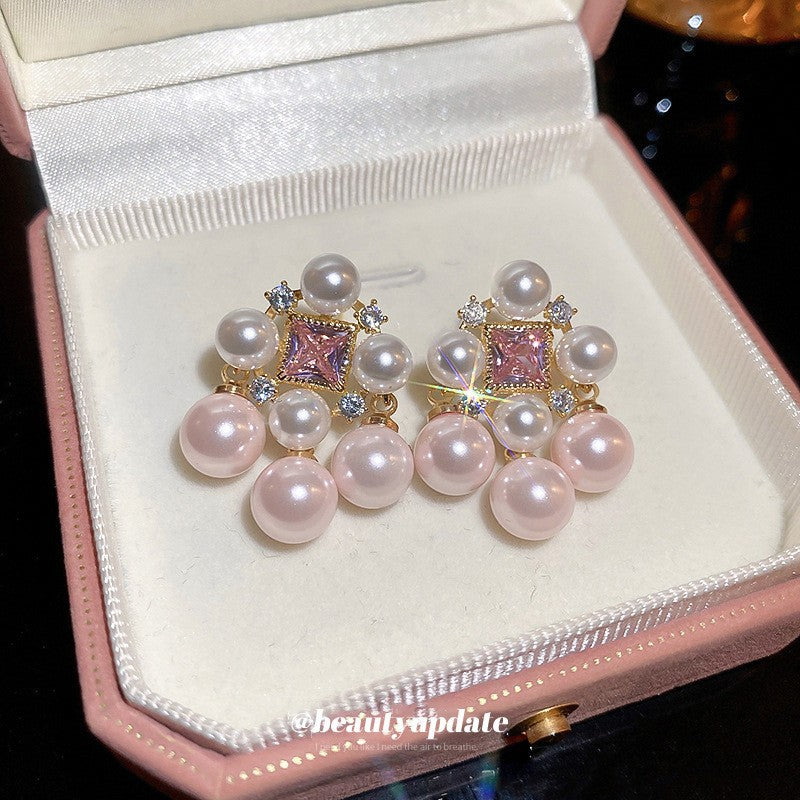 Orecchini da donna vintage eleganti a forma di stella geometrica con perle simulate e zirconi, perni in acciaio placcato