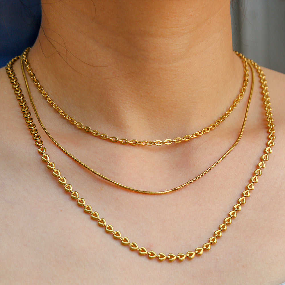 Collana da donna a triplo strato con catena snake in acciaio inossidabile geometrica e minimalista, placcata in acciaio al titanio