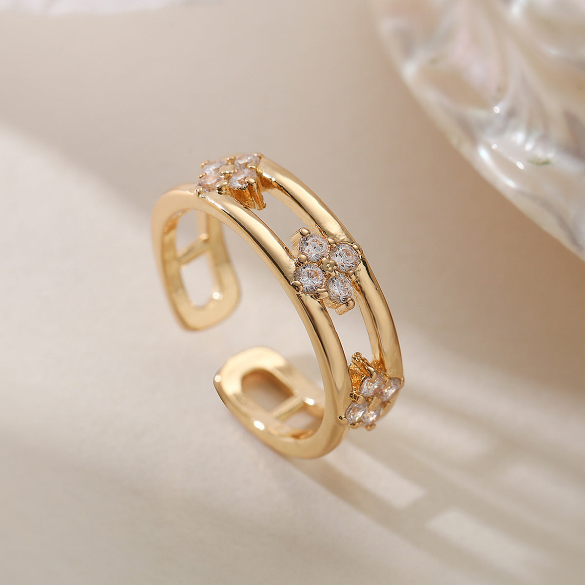 Minimalist Geometric Hollow-Out Ring for Women Made of Brass with 18K Gold Plating and Zircon Inlay