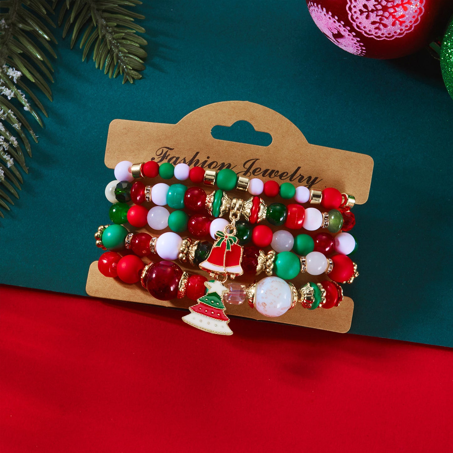 Set di braccialetti elastici da donna a tema natalizio alla moda con perline di Babbo Natale e renne in acrilico in lega