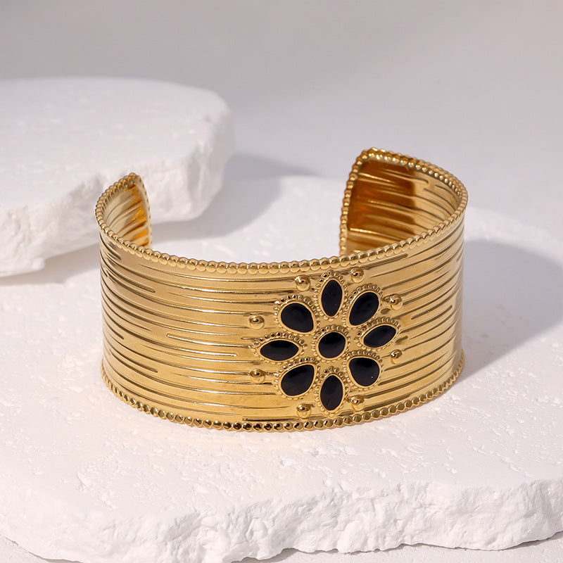 Minimalist Sun Symbol Bracelet for Women in Stainless Steel with 18K Gold Plating and Adjustable Open Bangle Design