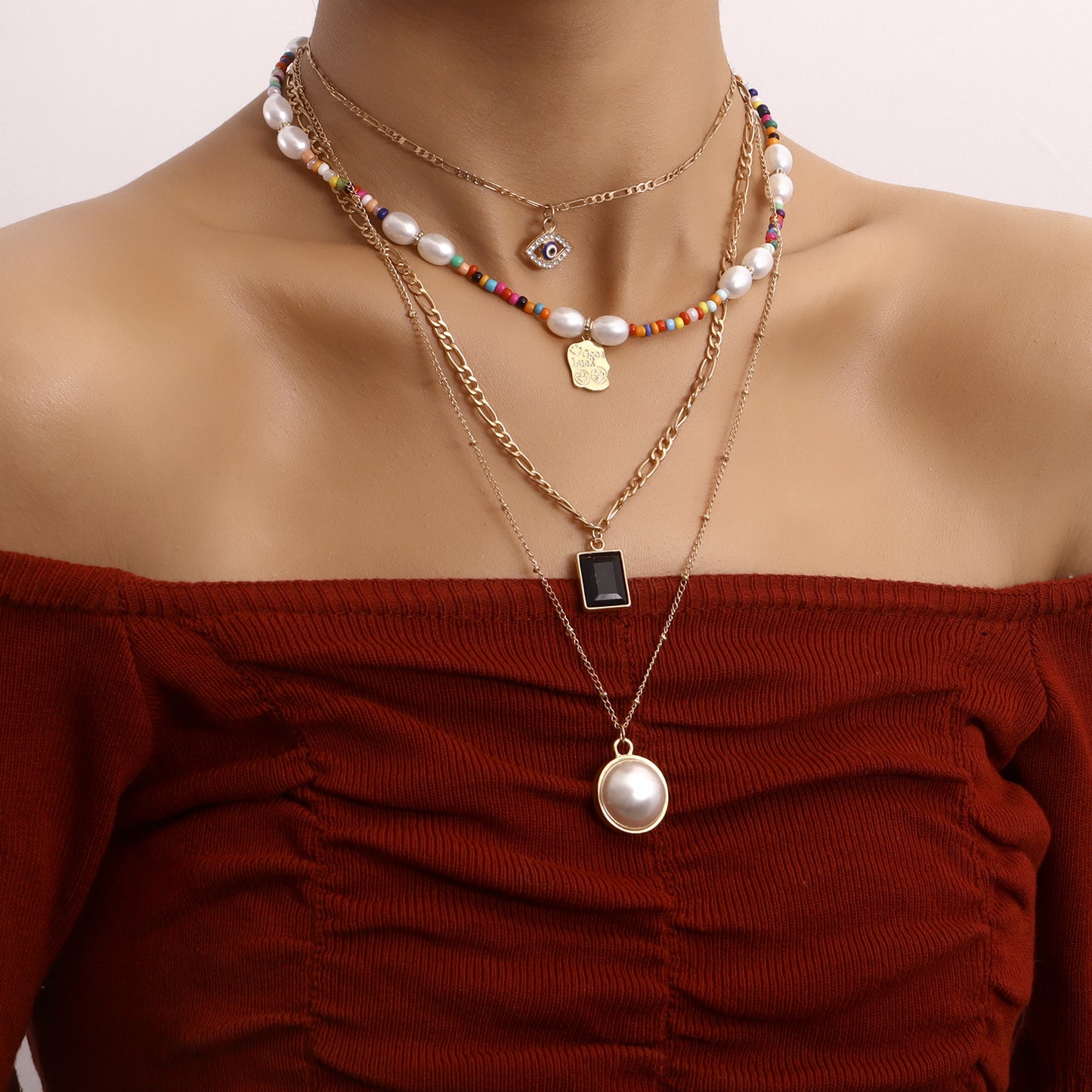 Sweet and Edgy Multi-Layer Evil Eye Pendant Necklace for Women with Alloy Pendant and Plated Finish