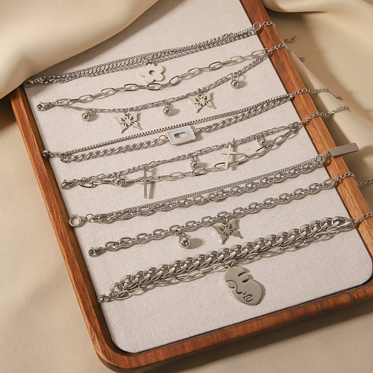 Bracciale cubano multistrato in acciaio inossidabile con ciondoli a farfalla e croce in stile INS, placcato oro, unisex