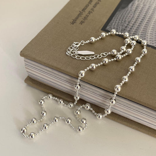 Minimalist Round Bead Necklace in 925 Sterling Silver with Gold Plating, Geometric and Doll-Inspired Pendant Design