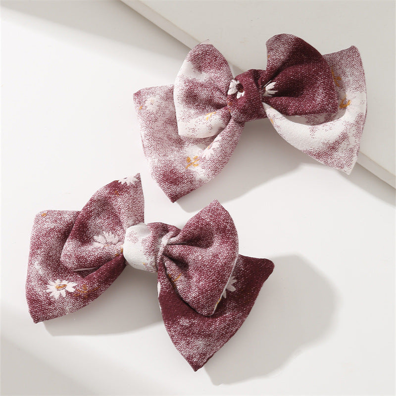 Set de pinzas para el cabello florales pastel dulces para niñas con diseño de tela en forma de moño en estilo ligero de lujo