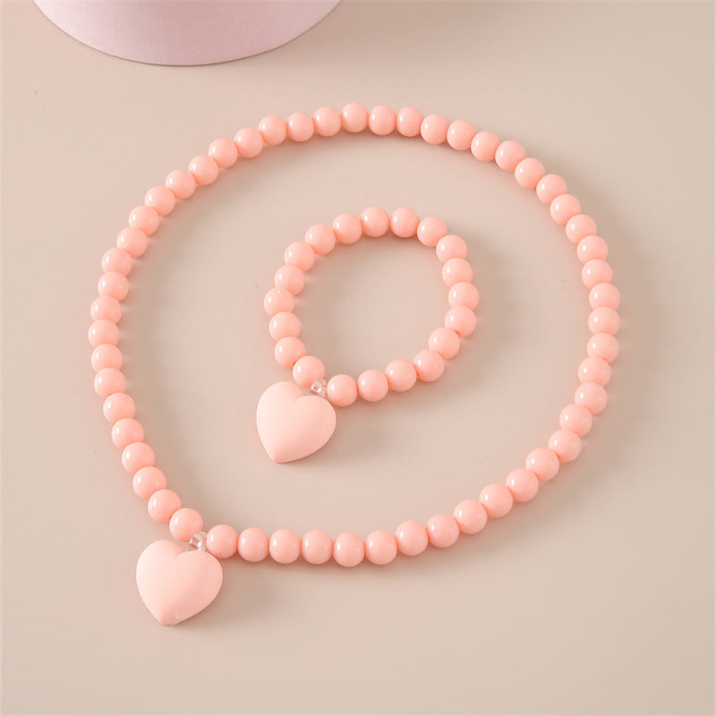 Set collana con ciondolo acrilico a cuore minimalista per bambini con catena di perline di plastica