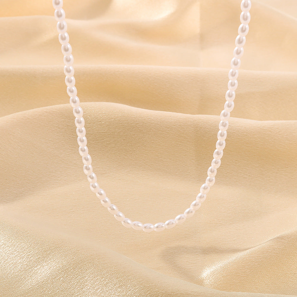 Collana con Pendente Ovale Minimalista in Acciaio Inox Placcato Oro 18K con Perle di Miglio, Stile INS, per Donna