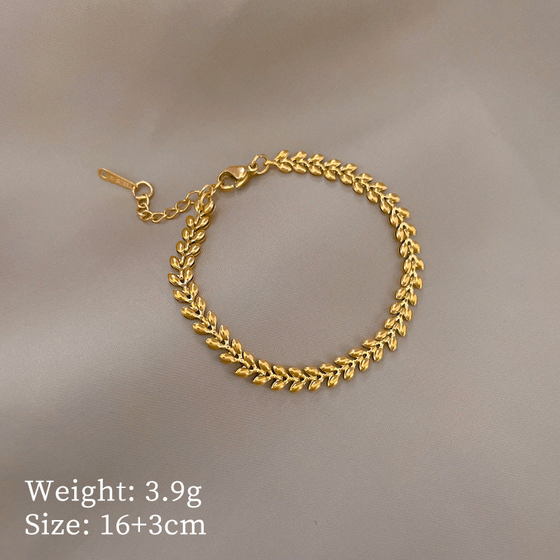 Vintage Women's Titanium Steel Rope Chain with Round Beads and Roman Numerals Gold Plated Wave Texture Four-Season Bean Hand Chain