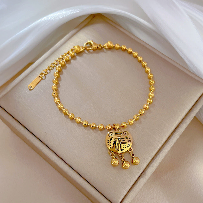 Pulsera de titanio chapada en oro con diseño de cierre Feng Shui para la longevidad, inspirada en Corea, con cuentas redondas y temática de la naturaleza para mujer