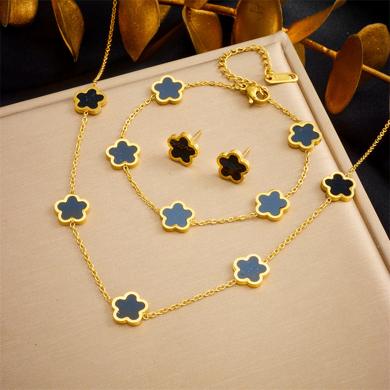 Set de pendientes, pulsera y collar chapados en acero inoxidable con diseño de flores vintage de cinco pétalos para mujer