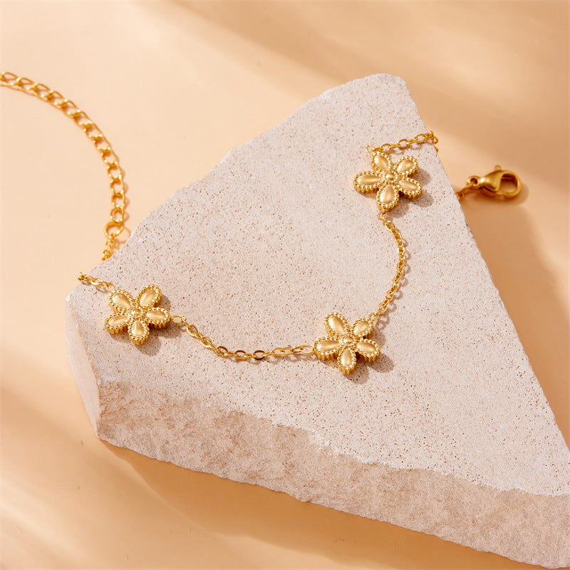 Bracciale da donna in acciaio inossidabile placcato con motivo floreale minimalista