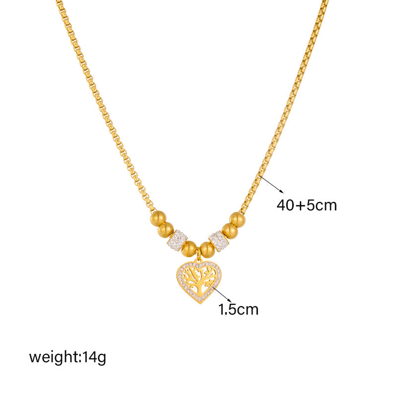 Elegante collar minimalista de acero de titanio con colgante en forma de corazón del Árbol de la Vida, chapado en oro y con cadena de cuentas para mujer