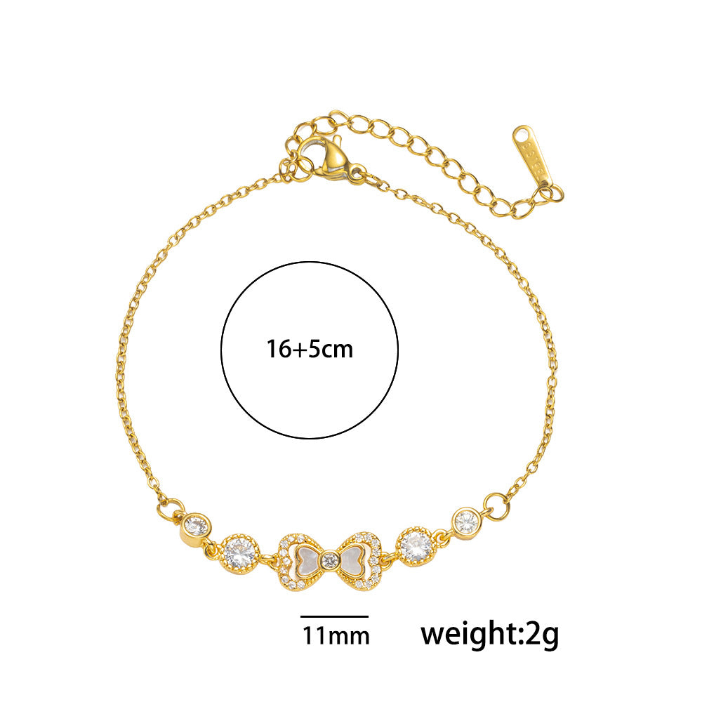 Elegante pulsera de acero de titanio en forma de lazo con incrustaciones de circonita, ajustable para mujer, accesorio de moda de lujo