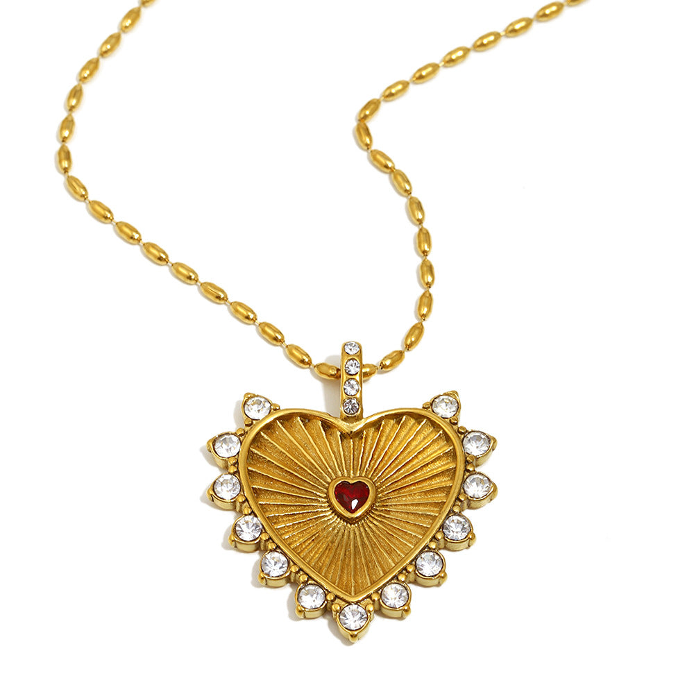 Collar con colgante minimalista de acero inoxidable en forma de corazón para mujer con baño de oro de 18K y elegante grabado