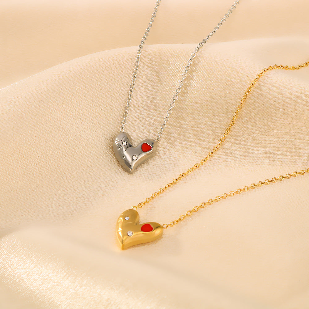 Collana asimmetrica minimalista a forma di cuore da donna in acciaio al titanio con intarsio di strass e placcatura sottovuoto in oro 18 carati