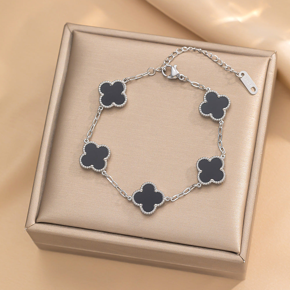 Set di collana, bracciale e orecchini a lobo da donna in acciaio al titanio minimalista con quadrifoglio fortunato