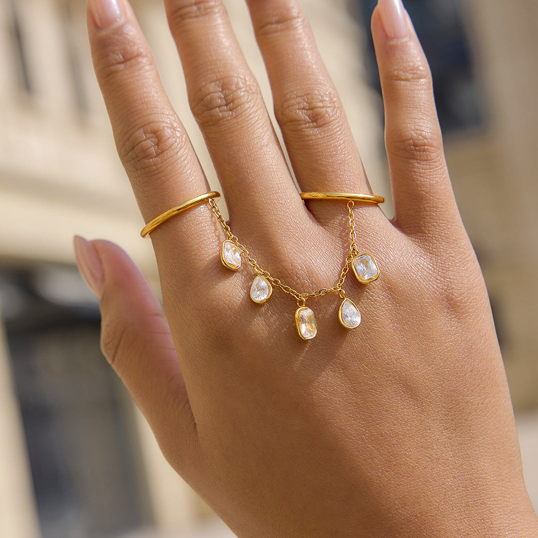 Elegant Geometric Stainless Steel Ring with Cubic Zirconia and Tassel Detail PVD Gold Plated