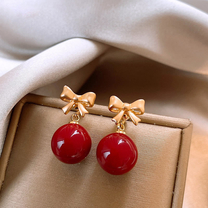 Orecchini a perno eleganti e minimalisti in resina a forma di fiocco da donna con perni in acciaio placcato, accessorio di moda di lusso
