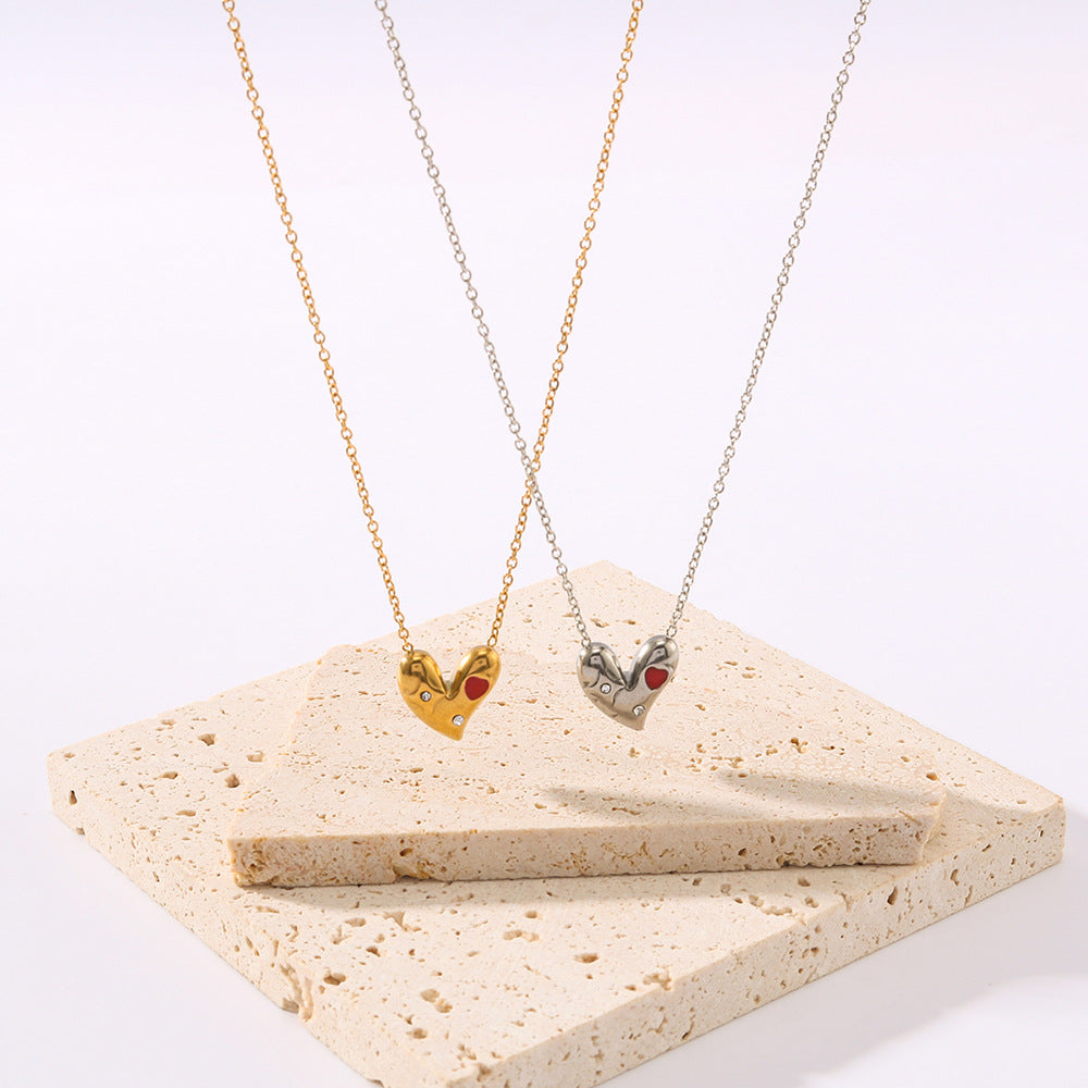 Collana asimmetrica minimalista a forma di cuore da donna in acciaio al titanio con intarsio di strass e placcatura sottovuoto in oro 18 carati