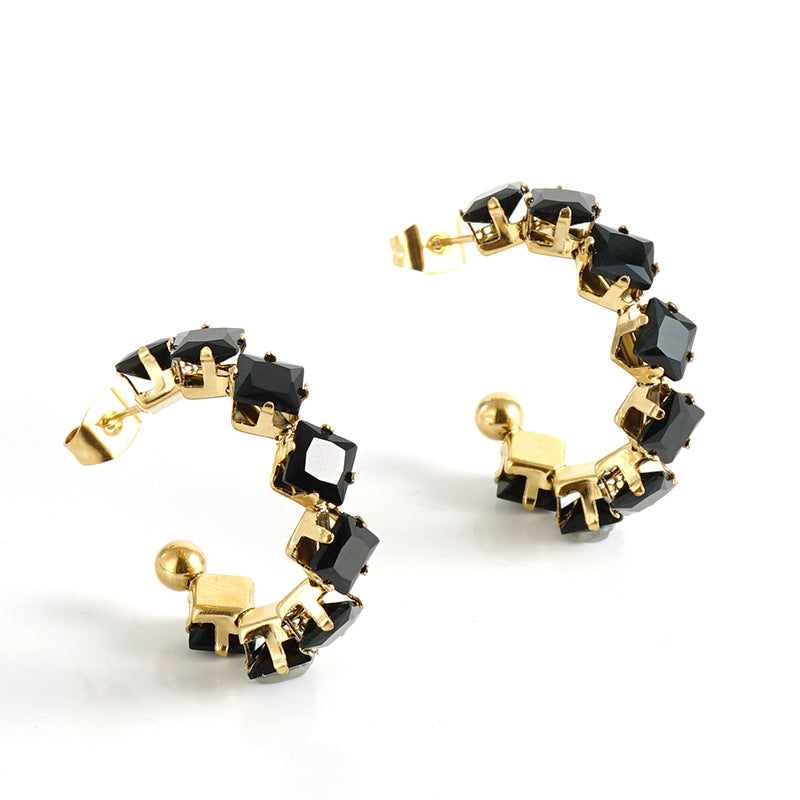 Orecchini a perno da donna alla moda geometrici in acciaio al titanio placcato oro 18K con zirconi