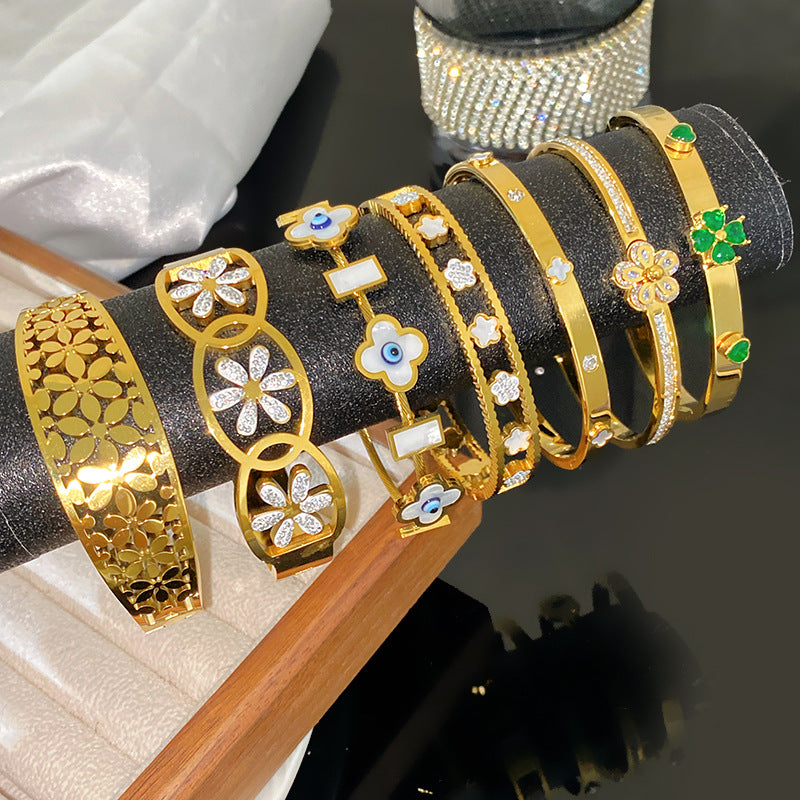 Luxury Floral Hollow Snowflake Daisy Titanium Steel Plated Bangle Bracelet