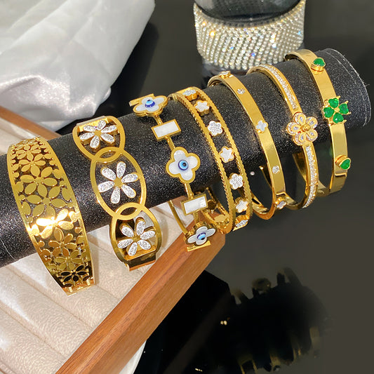 Luxury Floral Hollow Snowflake Daisy Titanium Steel Plated Bangle Bracelet