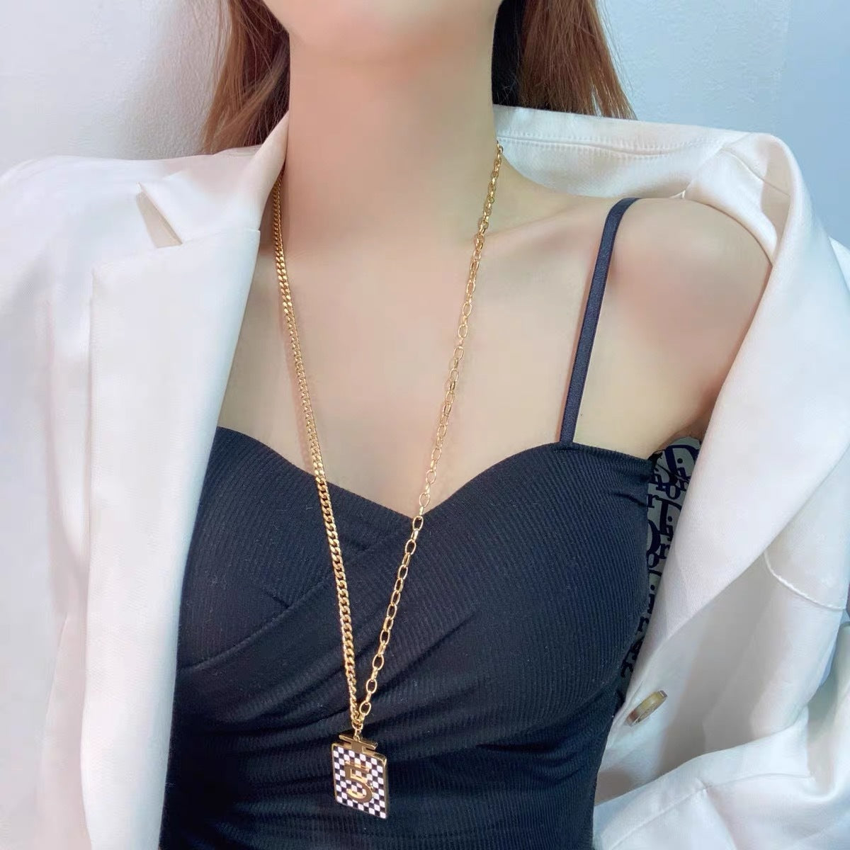 Minimalist Black and White Checkered Perfume Bottle Pendant Necklace for Women Titanium Steel Snake Chain Fashionable Office Wear Accessory