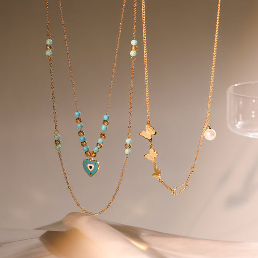 Collana con Ciondolo a Cuore Occhio di Allah in Stile Bohémien in Acciaio al Titanio per Donna